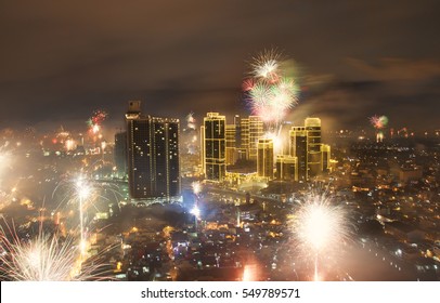 Manila, Philippines - 31 December 2016: 2017 New Years' Eve Fireworks With Rockwell Center In Makati Illuminated