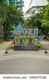 Manila, Philippines - August 2018: Make It Makati sign at Ayala Triangle Gardens