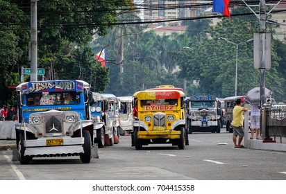 Manila, Philippines - Dec 21, 2015. Traffic On Street At Downtown In Manila, Philippines. Manila Is The Center Of Culture Economy Education And Government Of The Philippines.