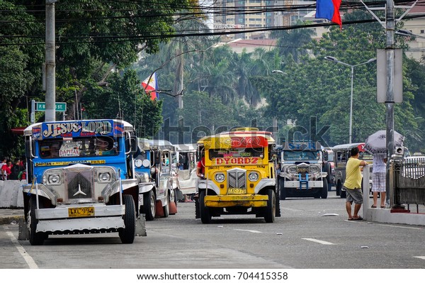 Manila,\
Philippines - Dec 21, 2015. Traffic on street at downtown in\
Manila, Philippines. Manila is the center of culture economy\
education and government of the\
Philippines.