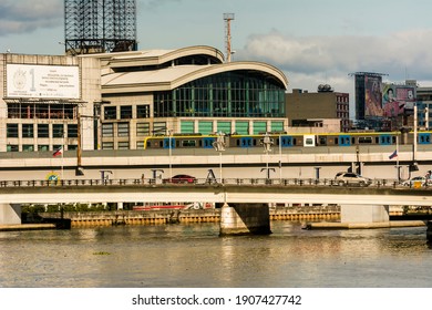 Manila, Philippines - Feb 2021: MacArthur Bridge, An LRT Train, And FEATI University In Quaipo.