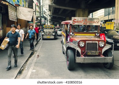 Manila, Philippines - February 17, 2016.  Manila Streets Walking People And Traffic. A Red Jeepny On Scene Under The Bridge.