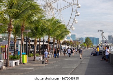 Manila, Philippines - February 27, 2020: View to embankment area near Mall of Asia in Manila, popular tourist spot.