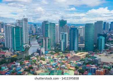 MANILA , PHILIPPINES - NOV 22 : City view of Manila Philippines from building in Makati on November 22 2018.  Manila is the most densely populated city proper in the world.