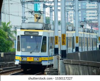 Manila, Philippines - November 11, 2016: Manila Light Rail Transit System Line 1 Train Arriving Carriedo Station 