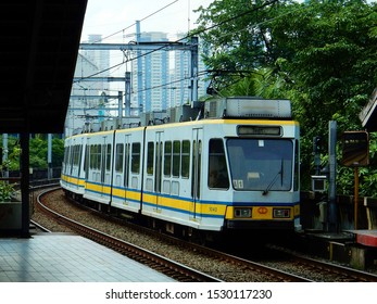 Manila, Philippines - November 11, 2016: Manila Light Rail Transit System Line 1 Train Arriving Carriedo Station 