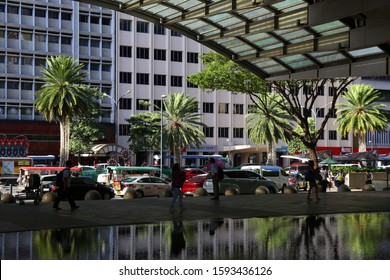 MANILA, PHILIPPINES - NOVEMBER 28, 2017: People Walk By The Philippine Stock Exchange In Makati City, Metro Manila, Philippines.