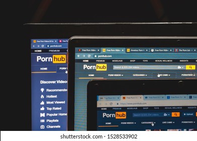 Manila, Philippines - October 11, 2019: PornHub websites loaded in multiple laptop screens. 