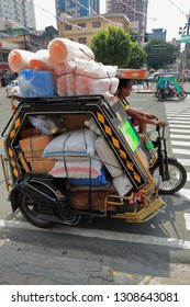 Manila, Philippines-October 24, 2016: Pedicabs are the easiest way of moving around the Binondo District-Chinatown area. This one stopped at Q.Paredes Rd.-L.Ruiz Pz.waiting for the light to turn green