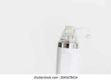 A Maniple, A Nozzle For A Cosmological Procedure. Needle Rf-lifting. Room, White Background. Cosmetology And Medical Services Office. Microneedle Radio Frequency Lifting Device. Hardware Cosmetology. 