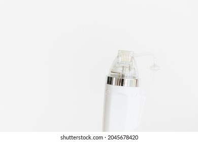 A Maniple, A Nozzle For A Cosmological Procedure. Needle Rf-lifting. Room, White Background. Cosmetology And Medical Services Office. Microneedle Radio Frequency Lifting Device. Hardware Cosmetology. 