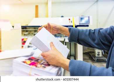 Manipulating envelopes for mailing - Shutterstock ID 601007444