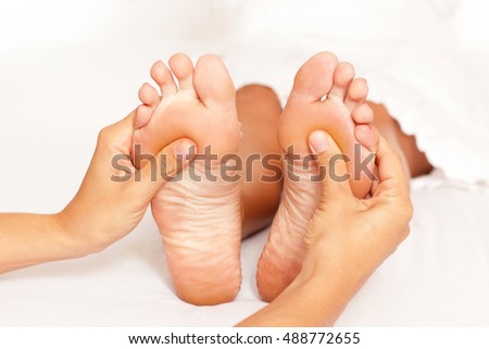 Manipulating a female feet