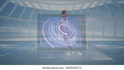 Manipulating woman wearing tech outfit interacting in control facility, with holographic interface. Futuristic, technology, interface, innovation, digital, control, immersive