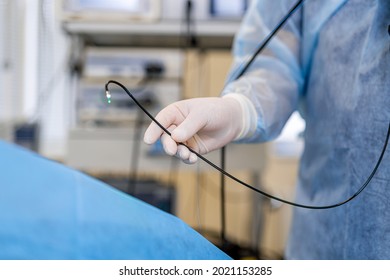 Manipulator digital endoscope for diagnostics of hollow organs, colonoscopy, gastroscopy. Selective focus on doctor`s hands