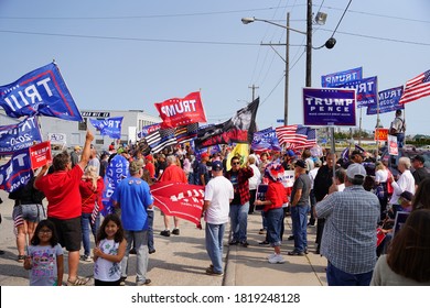 Manitowoc, Wisconsin / USA - September 21th, 2020: President trump and vice president mike pence supporters and joe biden and kamala harris supporters rallied together outside aluminum foundry.