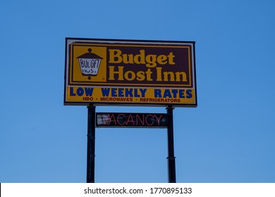 Mankato, Minnesota - June 5, 2020: Sign For A Budget Host Inn With Vacancy, A Cheap Motel Chain Known For Low Rates