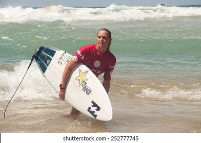 MANLY AUSTRALIA - FEBRUARY 15: Laura Enever leaving water after  the competition among women in the Australian Surfing Open at Manly Beach. February 15, 2015 Manly, Australia. 
