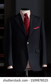 Mannequin With Bespoke Suit, Red Tie And Checkered Shirt In Atelier