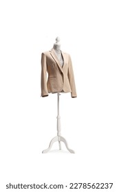 Mannequin doll with a beige suit isolated on white background