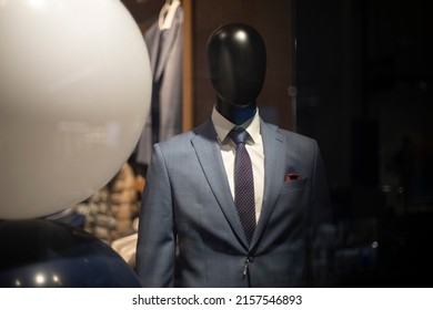 Mannequin Man In Suit. Expensive Suit On A Black Mannequin. Shop Window.