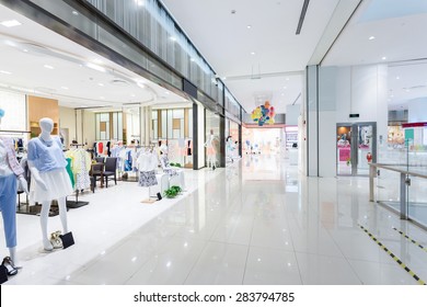 Mannequins In Fashion Shop Display Window