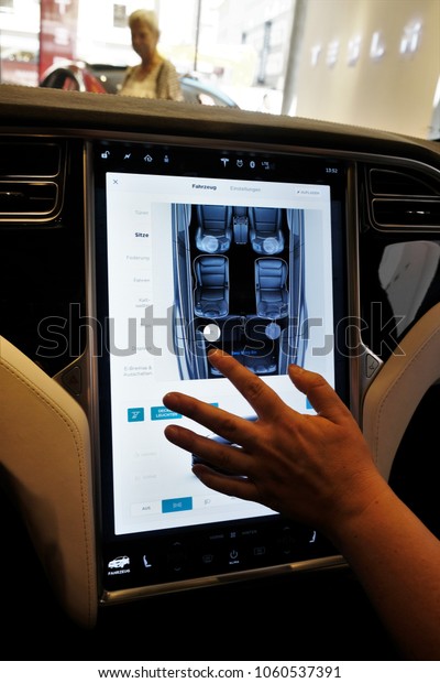 Mannheim, Germany - August 23, 2017: Tesla Model\
X electric car interior. The Tesla Model X is a mid-sized,\
all-electric, luxury, crossover SUV made by Tesla Motors, American\
automotive company