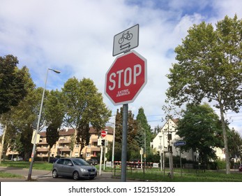 Mannheim,Germany-10.3.2019-Wide View Of STOP Sign With 'Eating Animals' Attached Under It, A Message Of Action To Stop Climate Change By Not Eating Meat, One Of The Alleged Culprit Of Global Warming