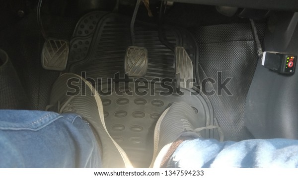 mannual car break, clutch and accelerator
panel with legs stock image for
background