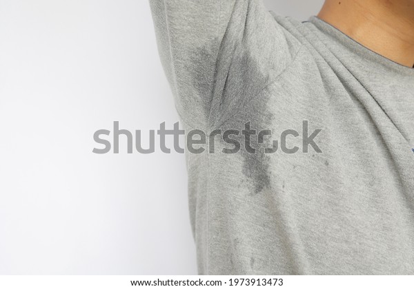 The man\'s armpits are\
wet with sweat.