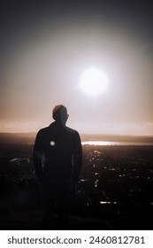 Man's back and the sun