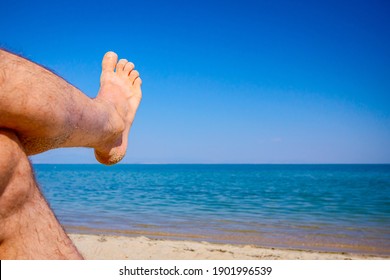 252 Legs man laying on sun Images, Stock Photos & Vectors | Shutterstock