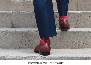 Man's Feet In Dress Shoes And Pants Suit Going Up Stairs 