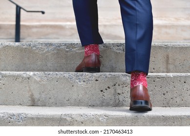 Man's Feet In Dress Shoes And Pants Suit Going Up Strairs