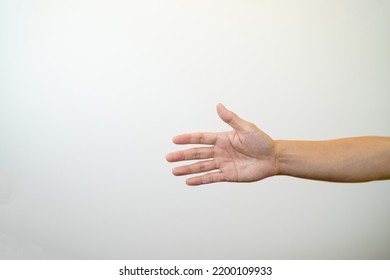 Man's Hand Asking For A Handshake.man Reaching Out