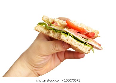 Man's Hand Holding Bitten Sandwich Isolated On White