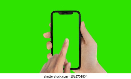 Man's Hand Holding Phone A Mobile Telephone With A Vertical Green Screen In Tram Chroma Key Smartphone Technology Cell Phone Touch Message Display Hand With Luma White And Black Key