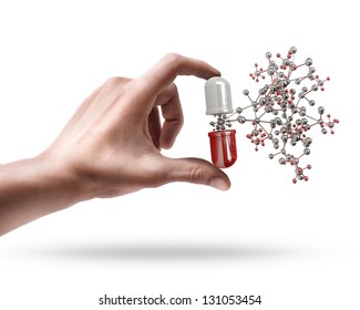 Man's hand holding pill with molecule structure isolated on white background - Powered by Shutterstock