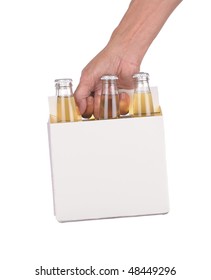 Man's Hand Holding A Six Pack Of Clear Beer Bottles Isolated Over A White Background