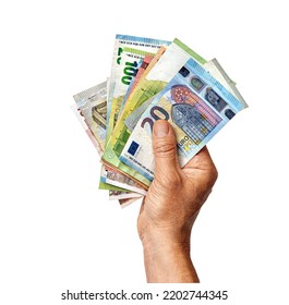 Man's hand holds euro money isolated on white background. Business concept