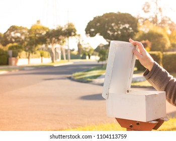 Man's Hand Open Tp Check The Post Box Infront Of The House In The Morning