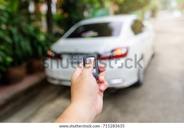 Mans Hand Pressing Remote Lock Unlock Stock Photo Edit Now