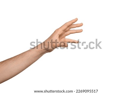 A man's hand reaches for something or holds something, fingers wide open. Isolate on a white background.