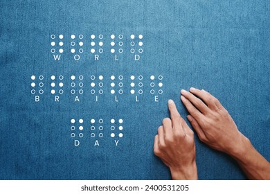 Man's hand reading braille. Annual celebration of World Braille Day on January 4. Day of the blind, world day of the blind, education day - Powered by Shutterstock