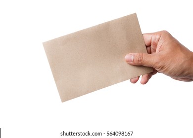 The man's hand sends a brown envelope isolated on white background. It represents the symbol of human communication before being replaced by a smartphone.