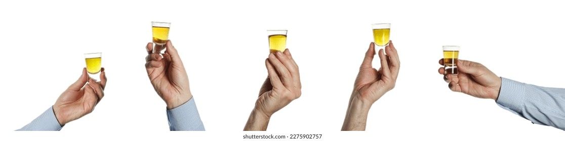 man's hand with a shot of whiskey isolated - Shutterstock ID 2275902757