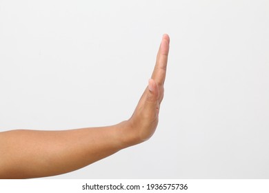 Man's hand with stop gesture. Isolated on white background