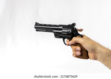 A Man's Hand With A Toy Gun (Japanese, 30s, No Face)