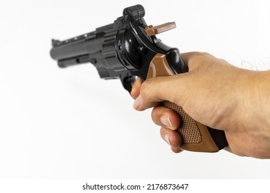 A Man's Hand With A Toy Gun (Japanese, 30s, No Face)