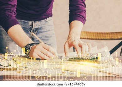 Man's hands with data theme multi exposure drawings. Network and data concept.